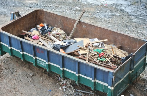 Electric waste collection van parked outside a Harrow commercial property