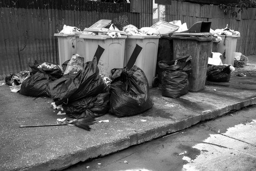 People disposing of old furniture in Harrow
