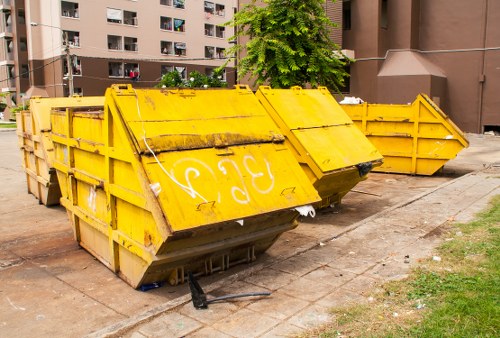 Commercial waste removal truck operating in Harrow